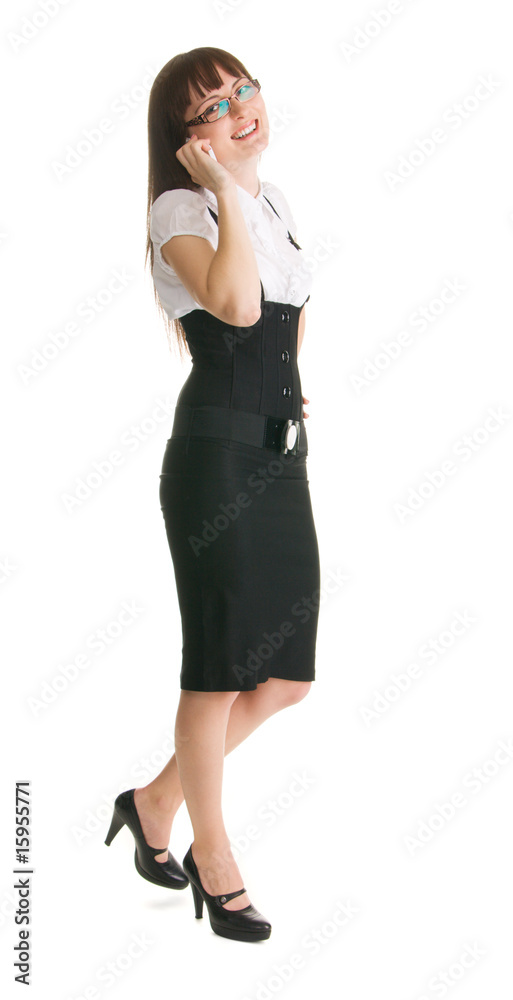 Young businesswoman speaking over the mobile phone Young businesswoman speaking over the mobile phone