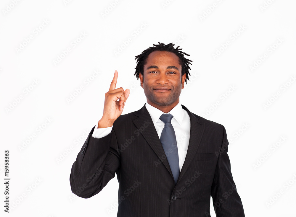 Afro-American businessman pointing upwards Afro-American businessman pointing upwards