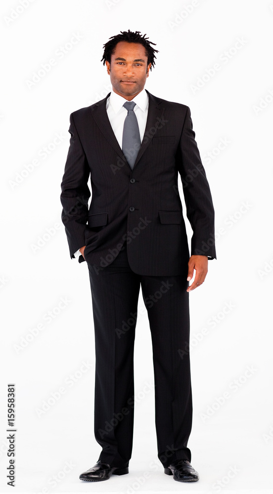 Serious businessman standing in front of camera Serious businessman standing in front of camera