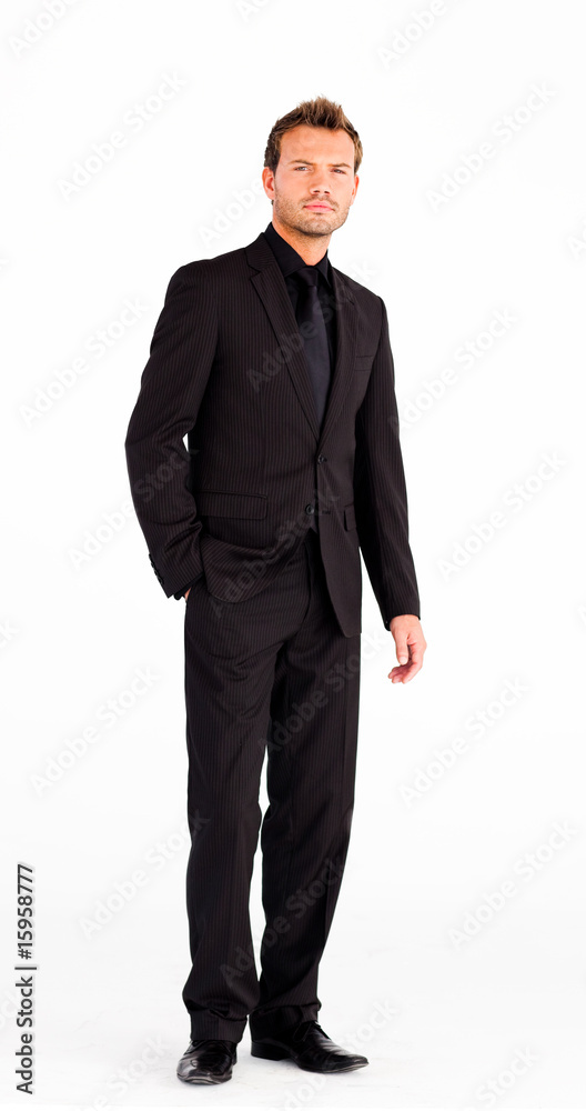 Handsome businessman standing in front of camera Handsome businessman standing in front of camera