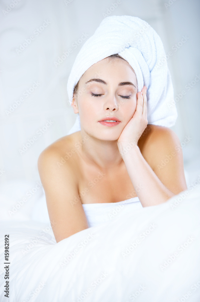 Portrait of cute teenage girl wearing towel on her head Portrait of cute teenage girl wearing towel on her head