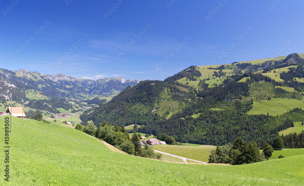swiss landscape with village in mountains