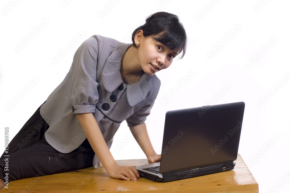 Business Woman Using Laptop on White Background and Smiling Business Woman Using Laptop on White Background and Smiling