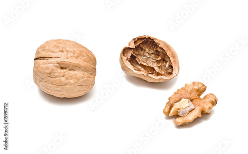 Cracked walnut isolated on white background