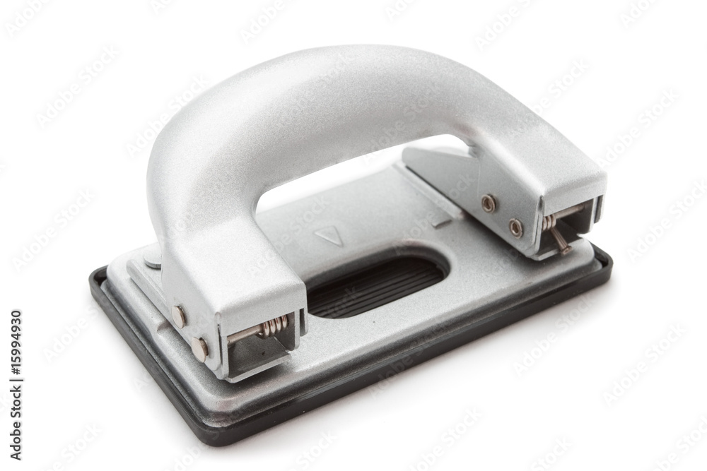 Grey office puncher over white background Grey office puncher over white background