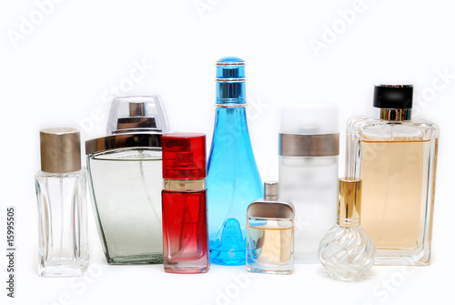 eight bottles of perfume isolated on white background