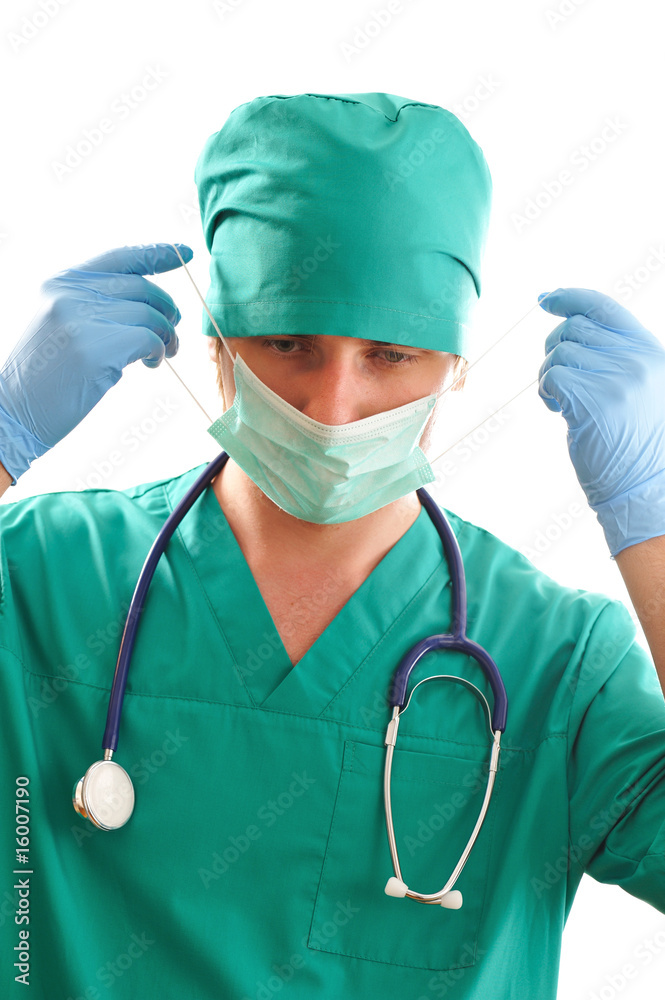 Pulling on surgical mask Pulling on surgical mask