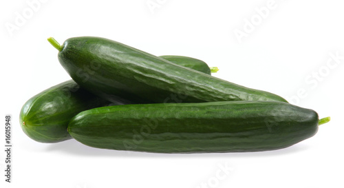 Fresh cucumbers on white