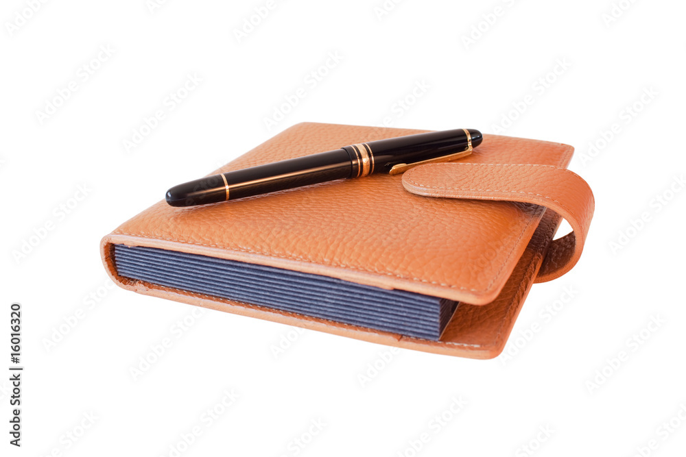 Fountain pen on diary isolated Fountain pen on diary isolated