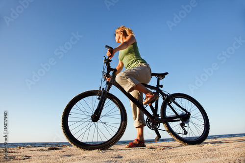 Young woman with bicycle