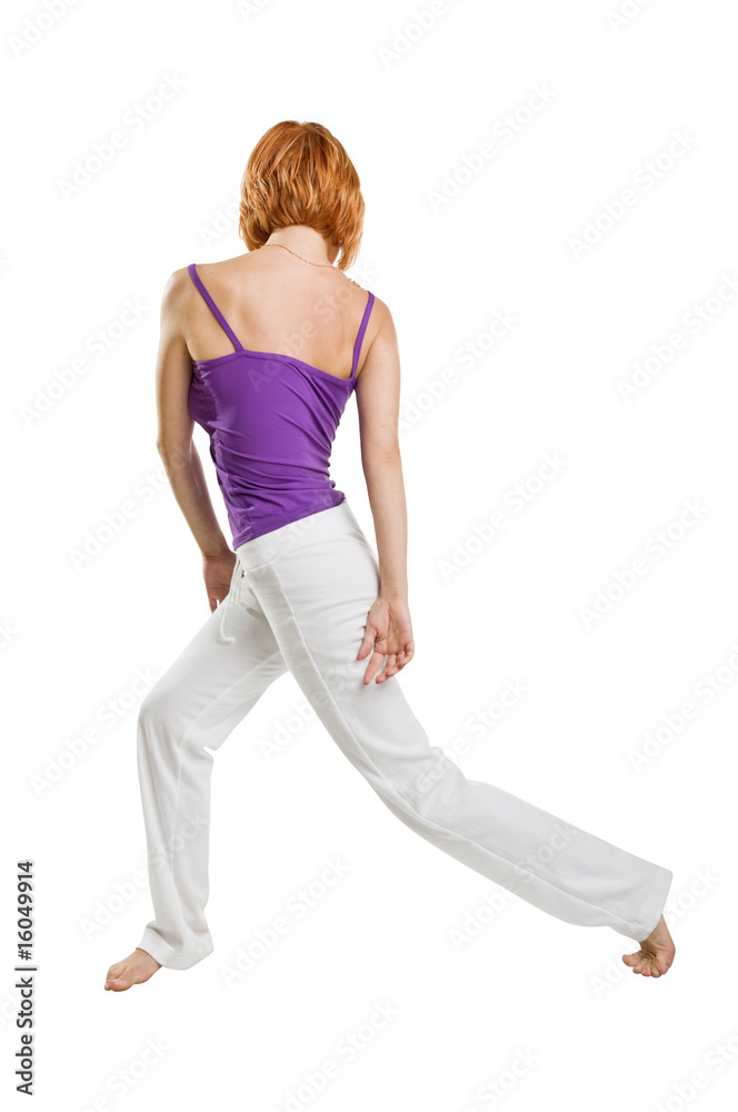 Red haired girl performing fitness exercises Red haired girl performing fitness exercises