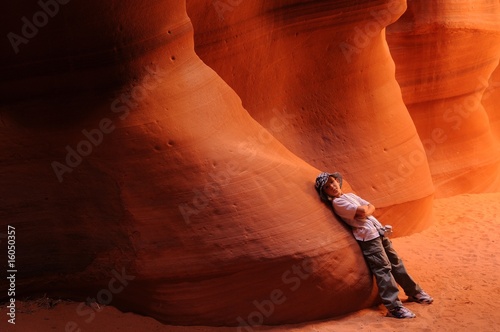 Boy resting in Antelope Canyon