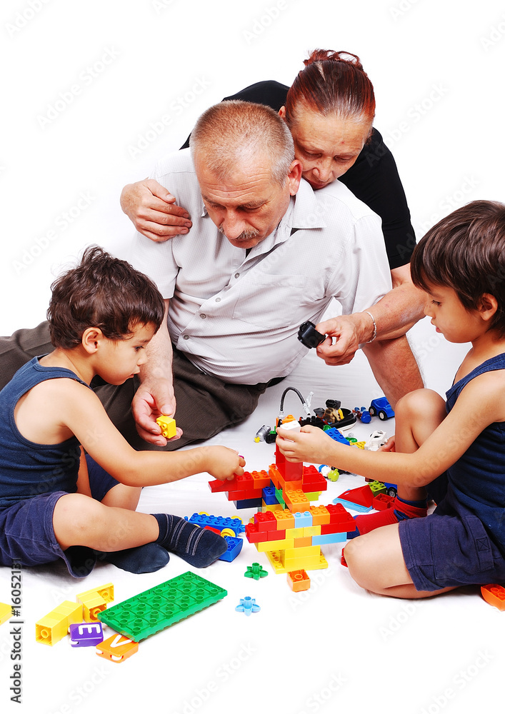 Parenting and playing with two boys isolated