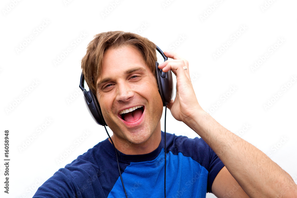 Attractive man with headphones, Handsome man jamming out Attractive man with headphones, Handsome man jamming out