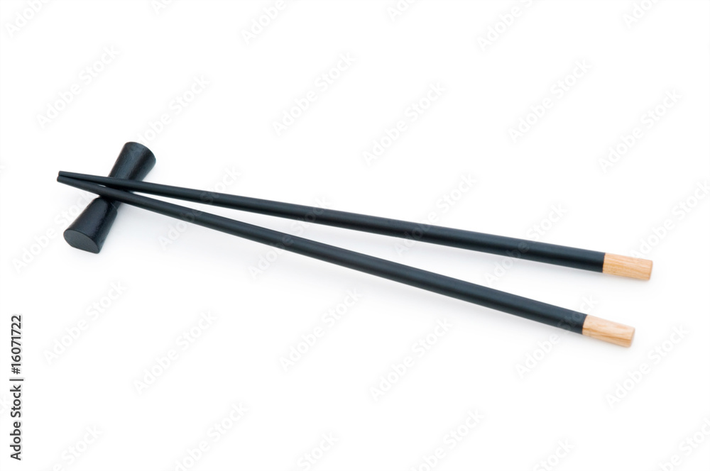 Black chopsticks isolated on the white Black chopsticks isolated on the white