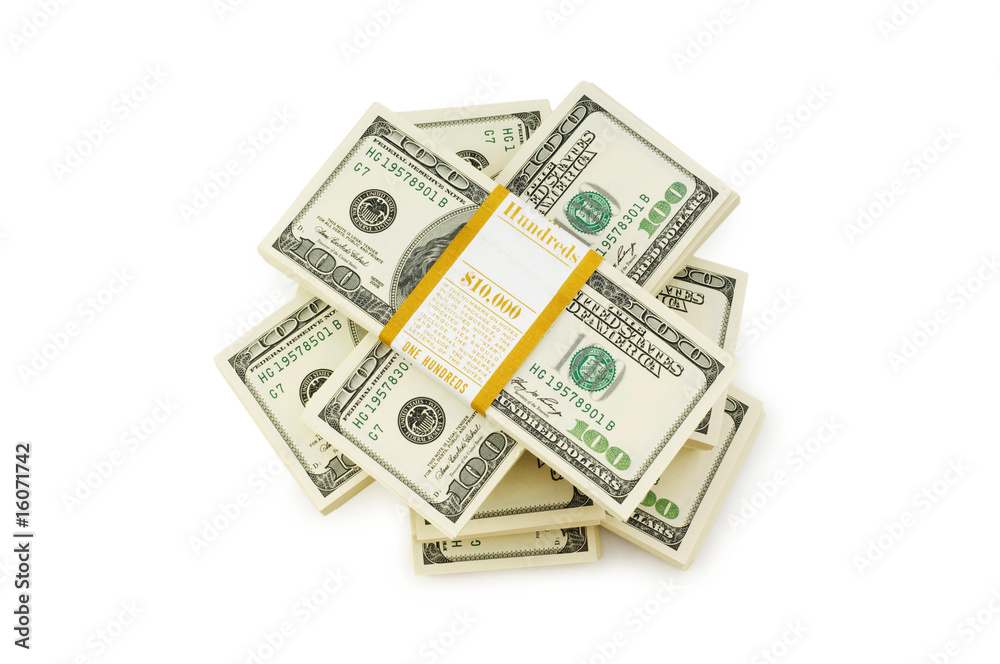 Stack of dollars isolated on the white Stack of dollars isolated on the white