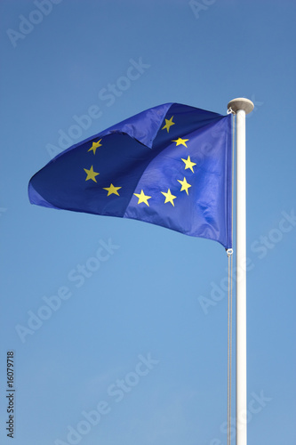 European Union flag against blue sky