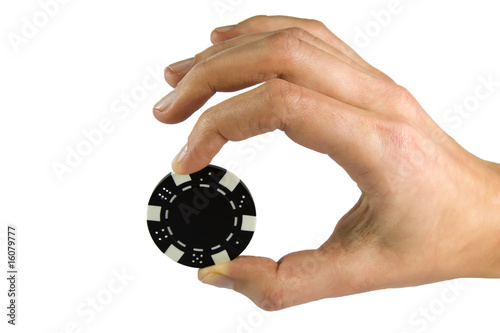 Human hand with poker chip isolated