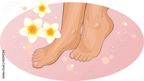 Feet with frangipani flowers in the SPA