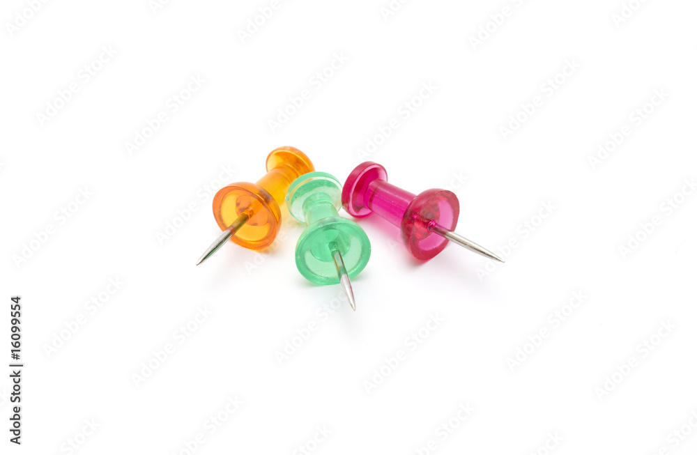 Different color drawing-pins on white background Different color drawing-pins on white background