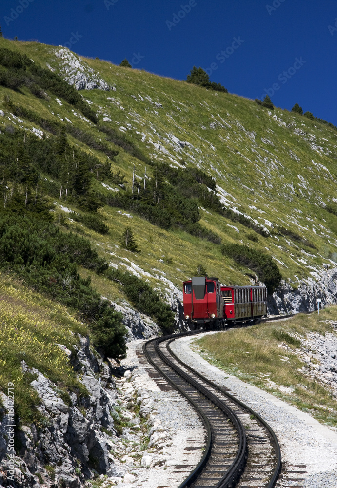 Red train in the mountains