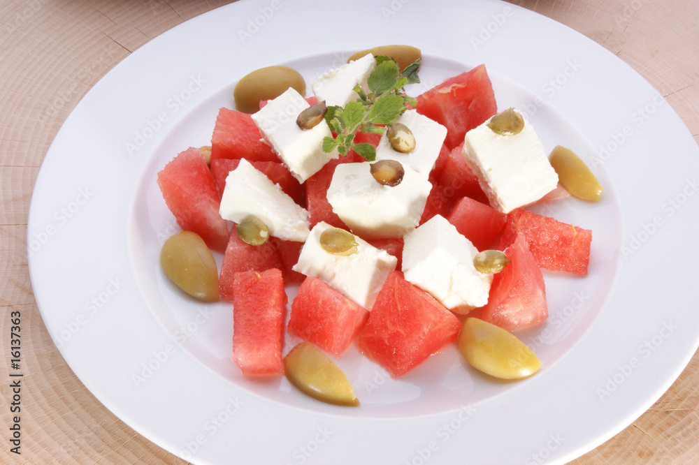 Melon and feta salad on a plate Melon and feta salad on a plate
