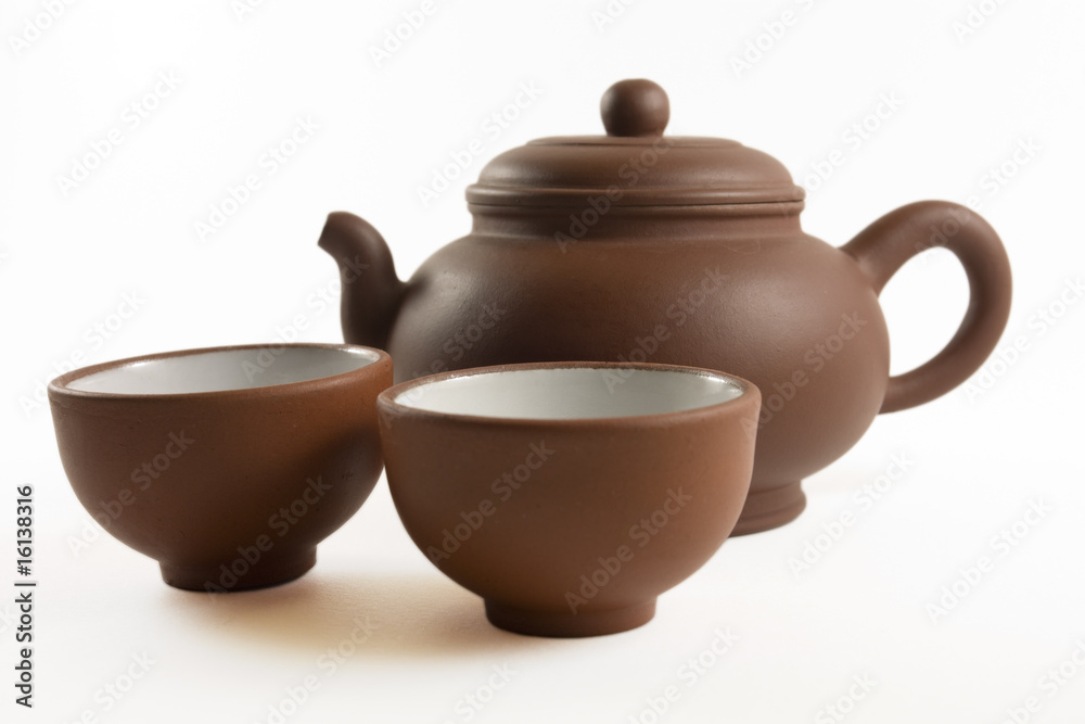 Brown chinese tea set with small tea cups