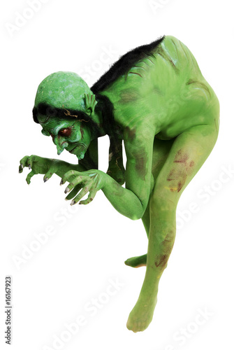 Green looking witch like creature