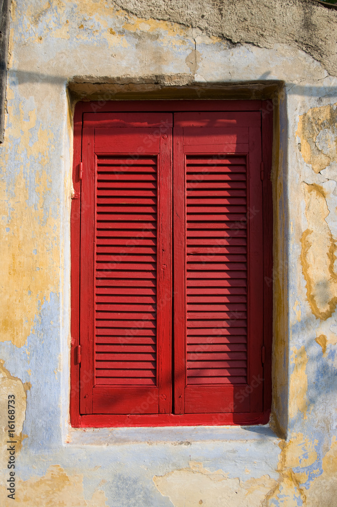 WINDOW WITH RED SHUTTER CLOSED