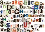 Colorful newspaper alphabet isolated on white