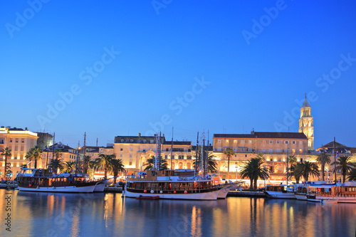 Split harbour depicting Diocletian's palace, by night
