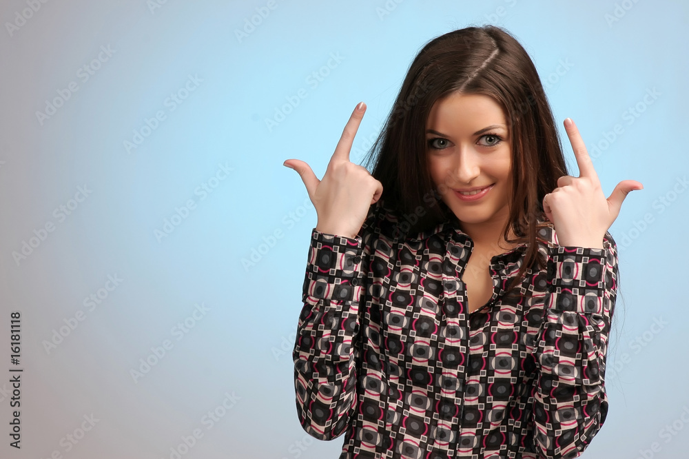 girl portrait showing thumb's up sign girl portrait showing thumb's up sign