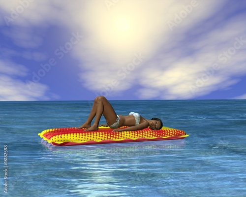Woman sunbathing in an infinity pool © Algol