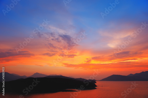 Beautiful colorful sunset over Aegean sea, Greece © sborisov