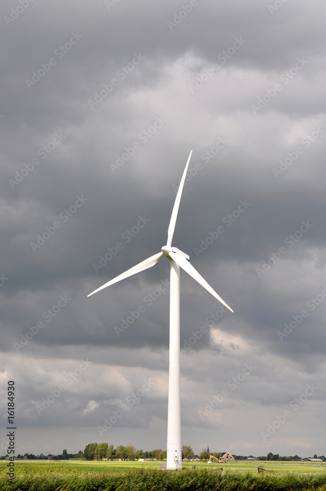 Sunlight wind turbine in cloudy skies