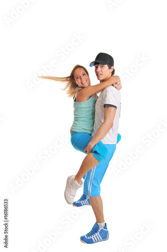 Young couple hugging on white