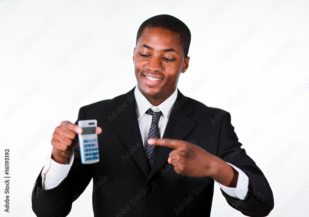 Portrait of a smiling businessman showing a calculator Portrait of a smiling businessman showing a calculator
