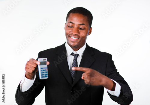 Portrait of a smiling businessman showing a calculator