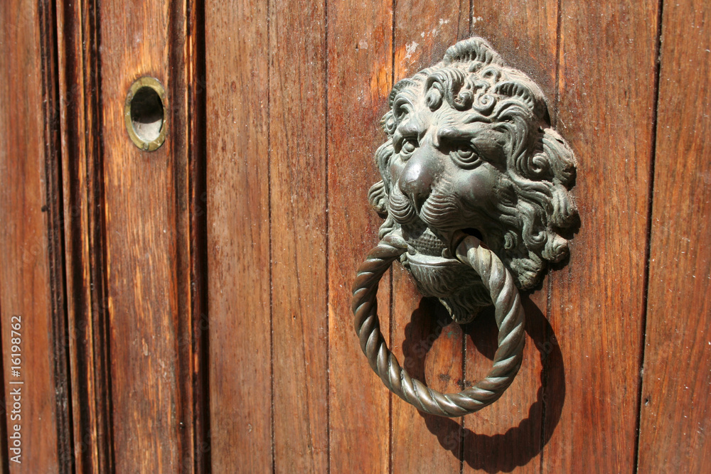 old venetian door knocker with a nice lion head old venetian door knocker with a nice lion head