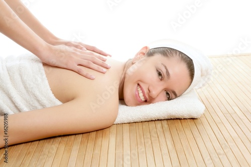 Beautiful woman on spa massage on back