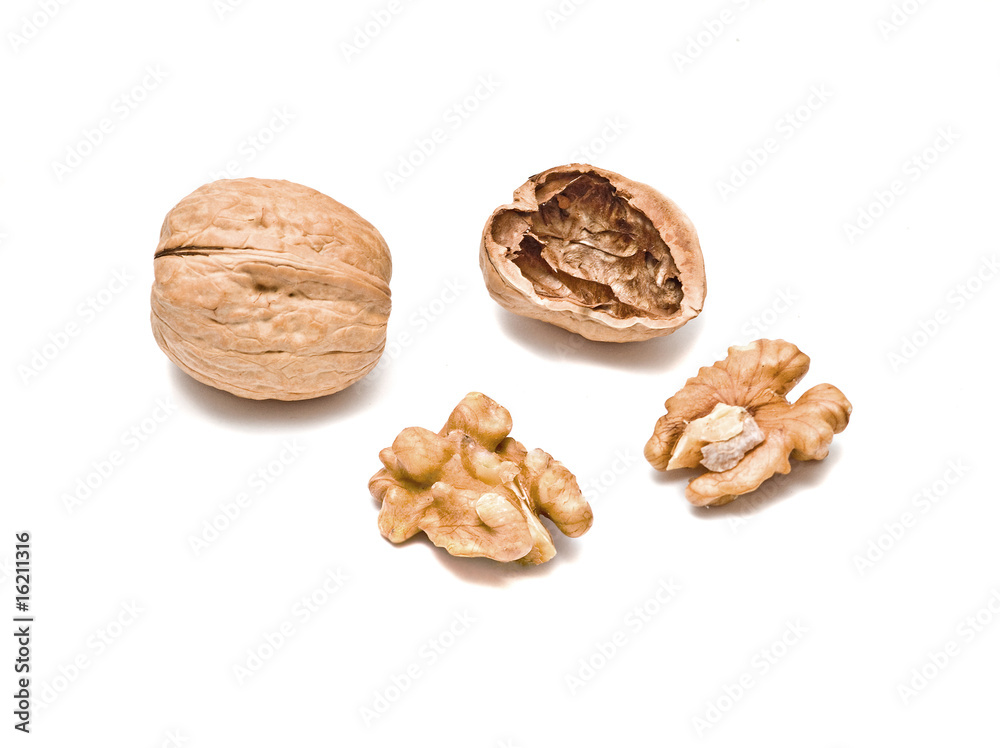 Cracked walnuts isolated on white background Cracked walnuts isolated on white background