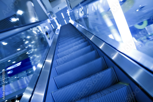 Moving escalator with stairs © Vladitto