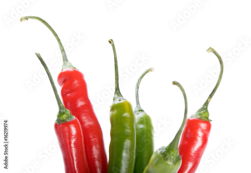 Red and green  chilly peppers  on white background