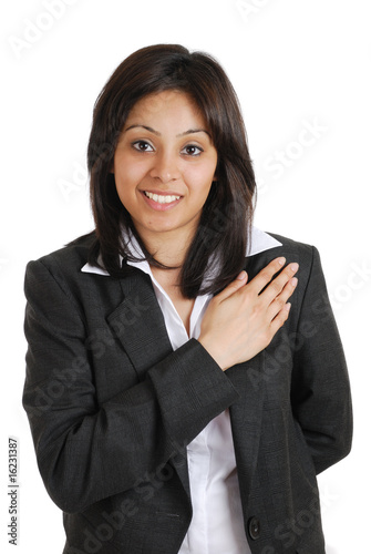 Business woman pledging with hand on chest