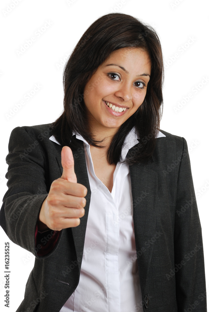 Business woman gesturing thumbs up