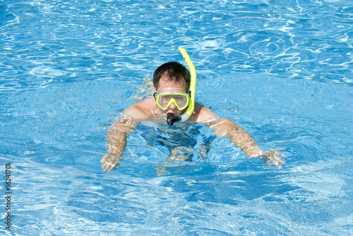 Man Snorkeling in the Pool