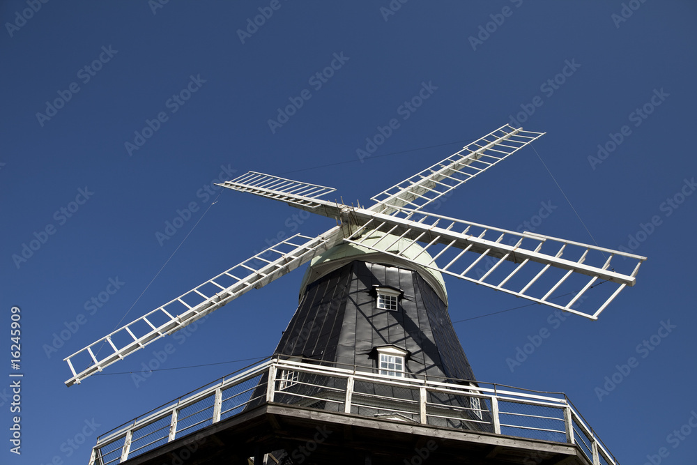 Windmill towards blue sky