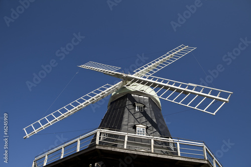Windmill towards blue sky