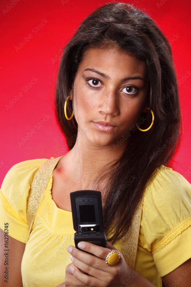 Yellow on red teen and cell phone Yellow on red teen and cell phone