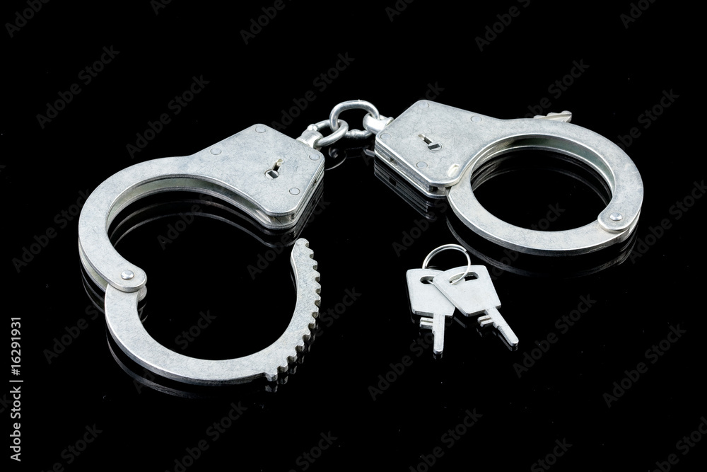 Handcuffs On A Glass Handcuffs On A Glass